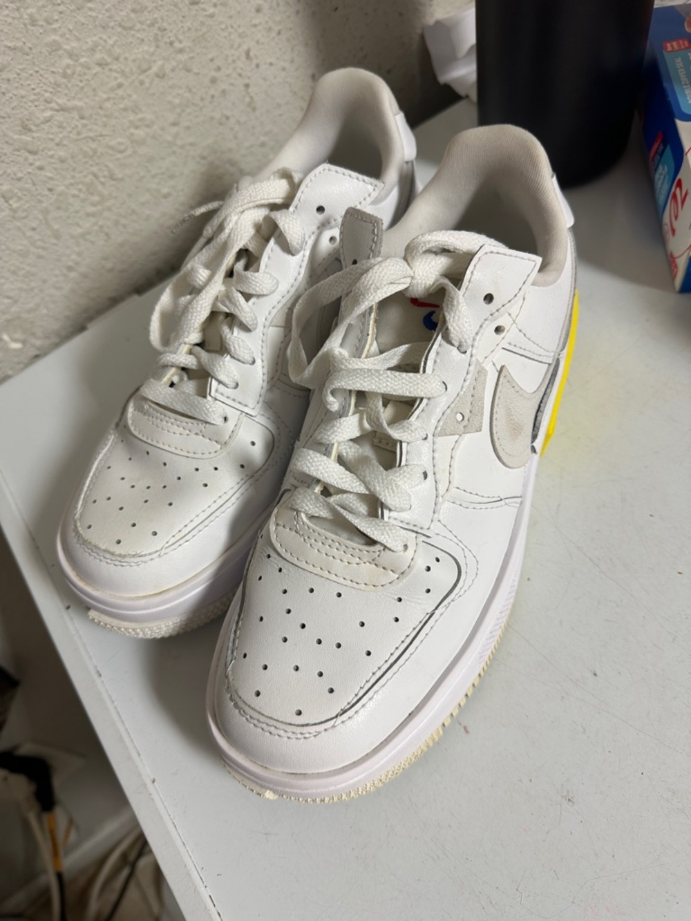 Nike Kids White Sneakers with Yellow Heel Accent